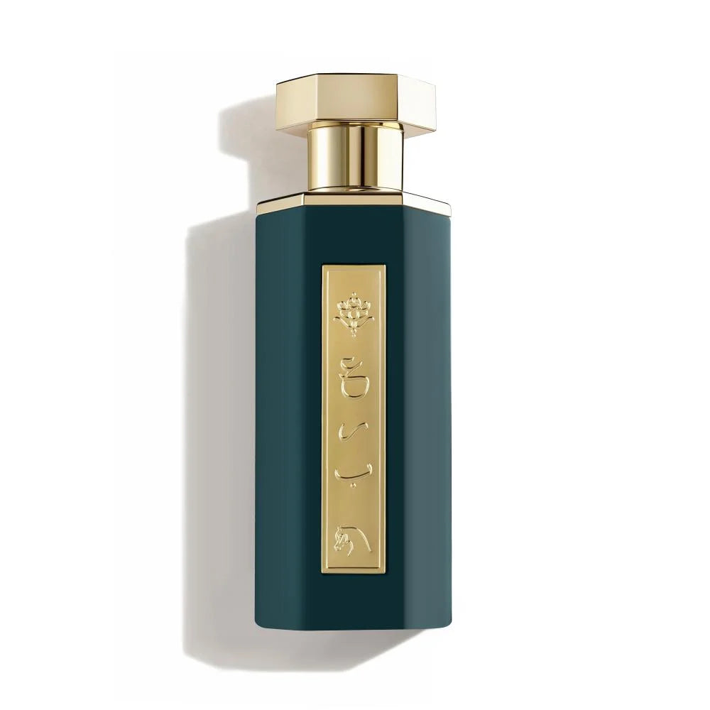 Perfume bottle with gold cap and label on a white background
